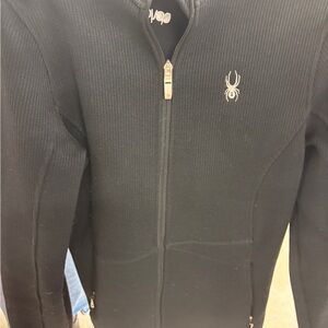 Black Full-Zip core sweater Spyder Sz. L
Might be a few pills.